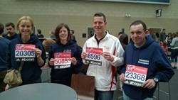 Carolyn, Victoria, Nick and Kev collecting their numbers